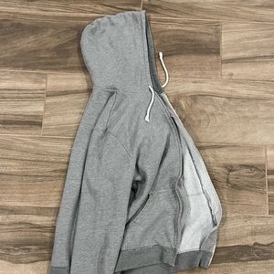 grey zip-up